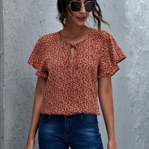 Tie neck flutter sleeve red top